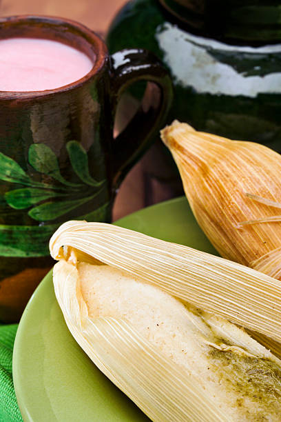 istock Tamales and atole, a traditional Mexican dish 153572123