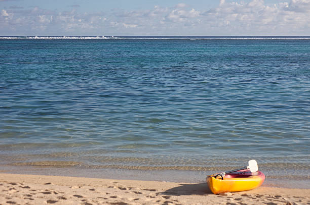 istock Sea Kayak on Beach at Sunset 153572322