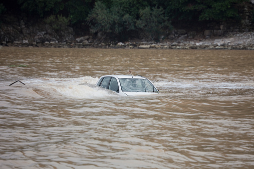 Car flooded in the Ocean - Flood Disaster in Olympos, Turkey, Asia