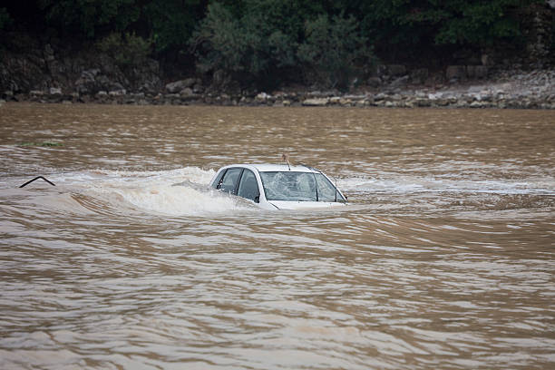 Car flooded in the Ocean Car flooded in the Ocean - Flood Disaster in Olympos, Turkey, Asia sunken stock pictures, royalty-free photos & images
