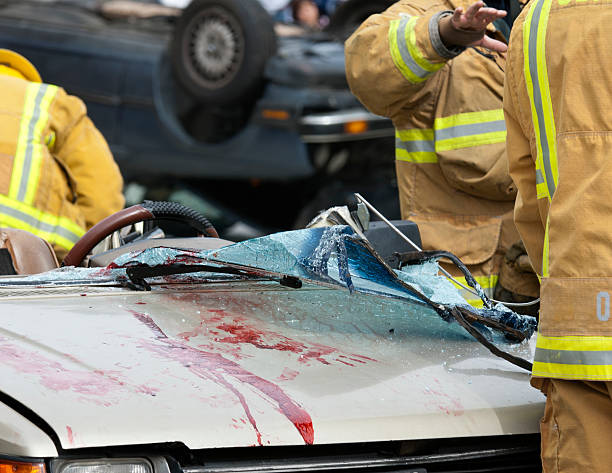istock Firefighters around vehicle rescue 153574135