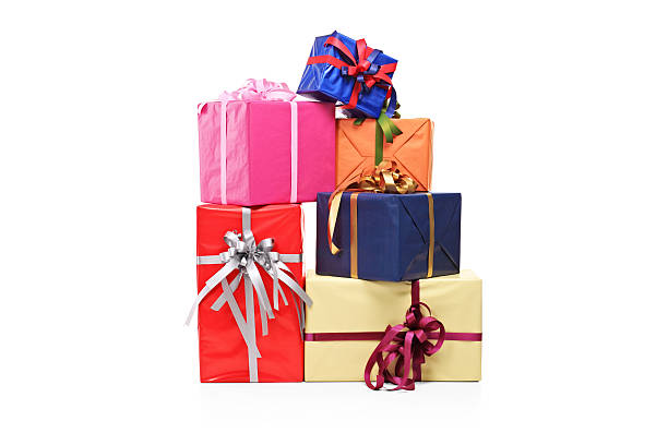 Pile of gift boxes in various sizes and colors Pile of gift boxes of various sizes and colors isolated on white background birthday present stock pictures, royalty-free photos & images