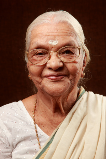 Portrait of a traditionally dressed happy Indian senior woman