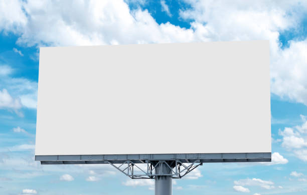 istock Pole outdoor billboard with blue sky background. clipping path for mockup white screen 1535758358