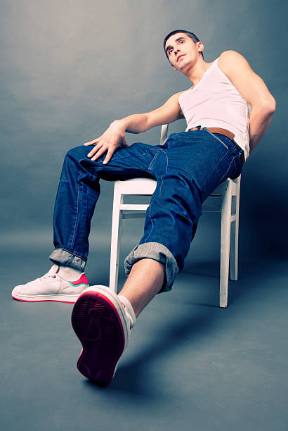 istock man on a white chair 153576058