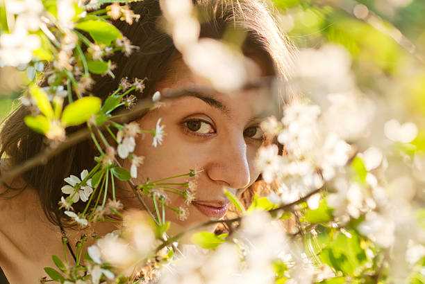istock Face of the girl with blossoming apple-tree 153576178
