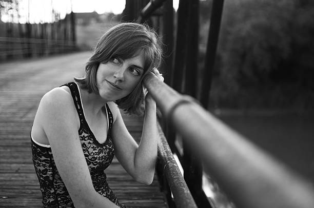 istock Young Adult on Bridge 153576242