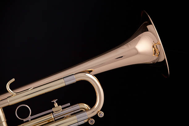 istock Gold trumpet cornet isolated on Black 153576645