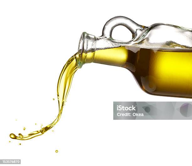 Pouring Olive Oil Stock Photo - Download Image Now - Olive Oil, Pouring, Cooking Oil