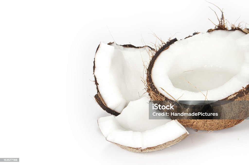 Noci di cocco su sfondo bianco - Foto stock royalty-free di Alimentazione sana