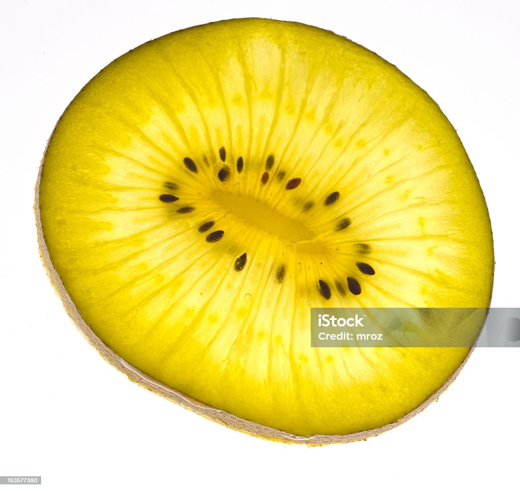 Gold kiwi slice Gold kiwi slice isolated on white background Close-up Stock Photo