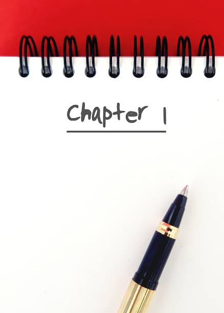 istock Notebook and pen on red background with text written CHAPTER 1, concept of start writing books - novel fiction non-fiction, first time writer or author 1535778369
