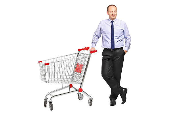 istock Man posing next to an empty shopping cart 153578131