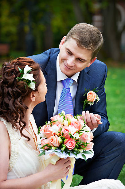 istock Elegant beautiful bride and groom in a meadow 153578762
