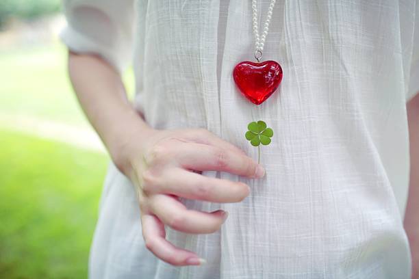 istock Red heart and green leaves in summer 153584457
