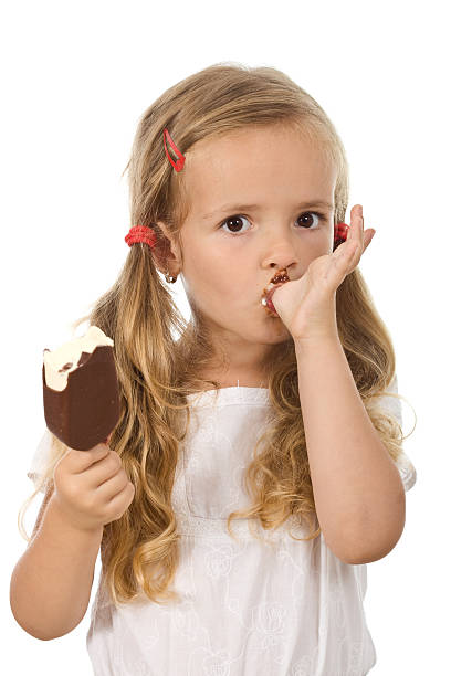 istock Little girl eating ice cream 153587484