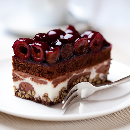 piece of delicious cake with sour cherries