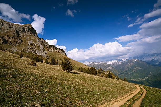 istock Mountain trail under blue sky with clouds. French Alps, Varan. 153588005