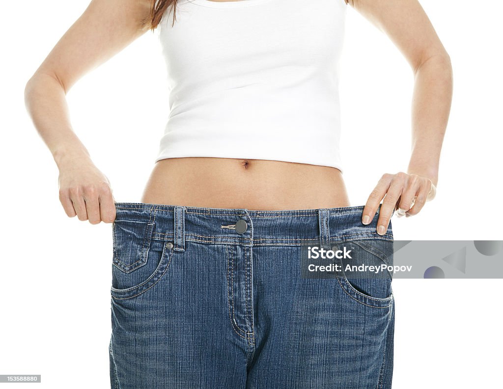 슬림 여자 당기기 확대됨 jeans - 로열티 프리 가냘픈 스톡 사진