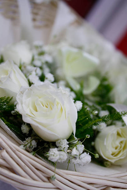 istock Wedding boutonnieres made from white roses 153589367