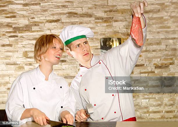 Portrait Of Happy Couple Preparing Meat Stock Photo - Download Image Now - Adolescence, Adult, Adults Only