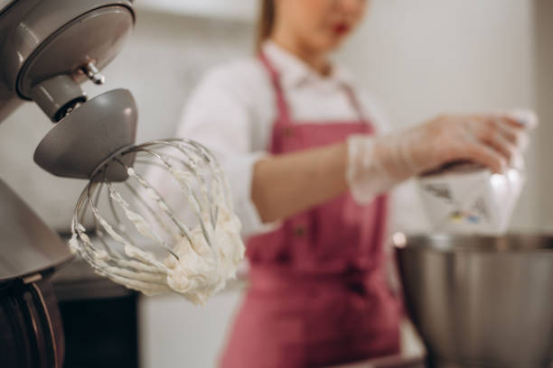 istock A beautiful white mixer with a metal cup stands in the modern kitchen. 1535917036