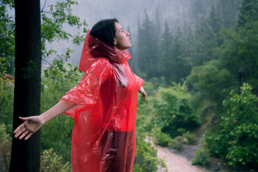 Woman enjoying rain weather