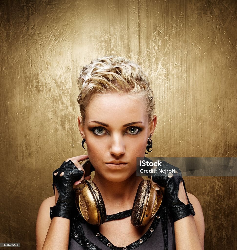 Portrait of an attractive steam punk girl with headphones Cyberpunk Stock Photo