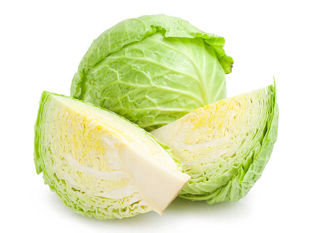 One head of lettuce cut in half with another whole head  cabbage-head with parts of cabbage isolated on white background cabbage stock pictures, royalty-free photos & images