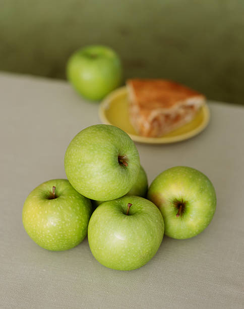 Green apples and apple pie stock photo