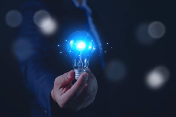 istock a light bulb in the hand of a businessman ideas and creativity 1535982943