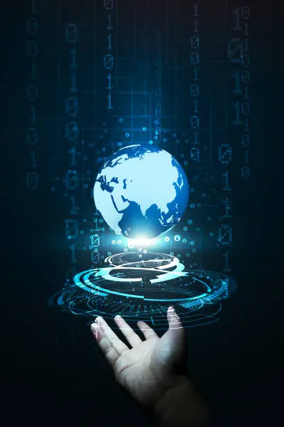 Photo of Hand holding global internet technology to connect people.Business global, social media and digital marketing.Technology and futuristic dark blue color background.