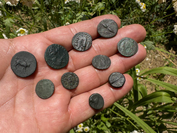 istock ancient greek and roman coins 1536056118