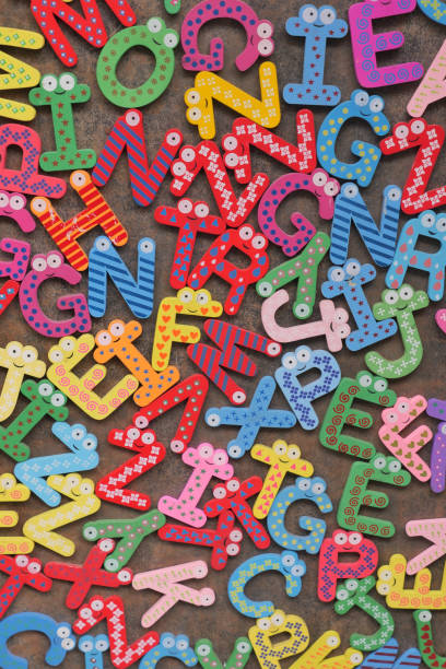 istock colorful plastic letters on white background, close up 1536077055