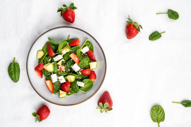 istock Summer fresh salad with strawberries 1536128475