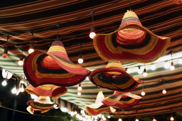 istock Array of bright, vibrant knitted hats and lightbulbs. 1536132855