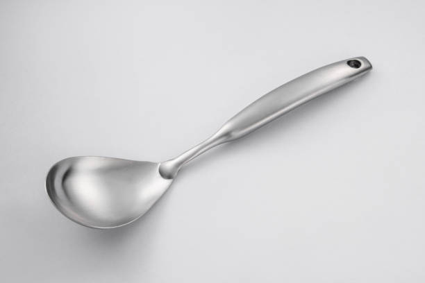 istock Stainless steel tableware and kitchen utensils placed on the desktop 1536157409