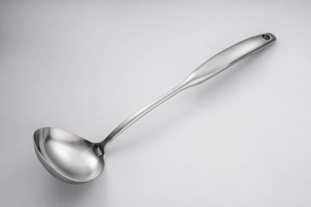 istock Stainless steel tableware and kitchen utensils placed on the desktop 1536157853