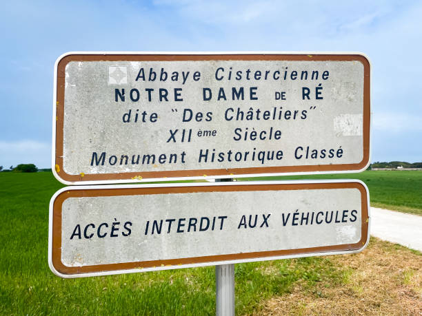 Sign of the Cistercian Abbey of Notre-Dame-de-Ré in La Flotte Sign of the Cistercian Abbey of Notre-Dame-de-Ré in La Flotte, France flotte stock pictures, royalty-free photos & images