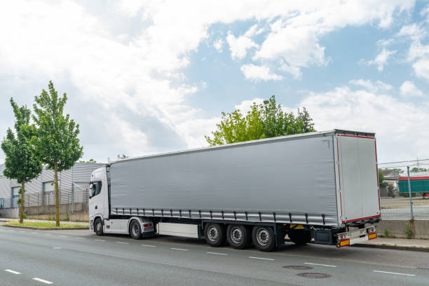 istock A large light trailer stands on the side of the road. 1536227775