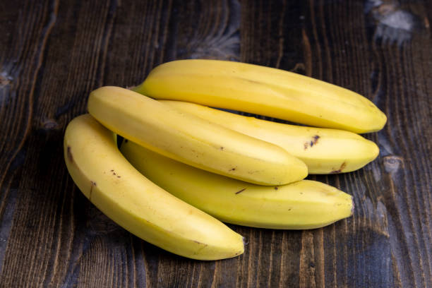 istock Ripe yellow bananas on the table 1536235412
