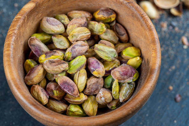 istock peeled fresh crunchy pistachios, green nuts pistachios 1536235595