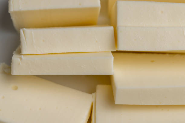 istock Sliced cream cheese for salads 1536235604