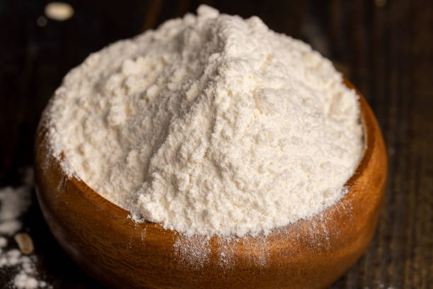 istock Wheat flour from a wooden bowl 1536235747