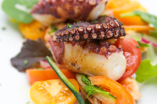 Roasted octopus with vegetables