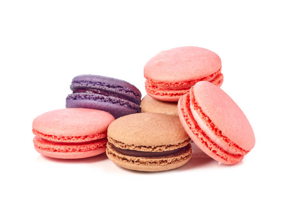 istock Heap of colorful macarons on white background 1536244830