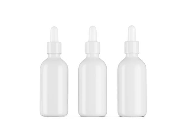 istock 3d Three White Blank Cosmetic Oil Dropper Bottles Isolated On White Background, 3d Illustration 1536293149