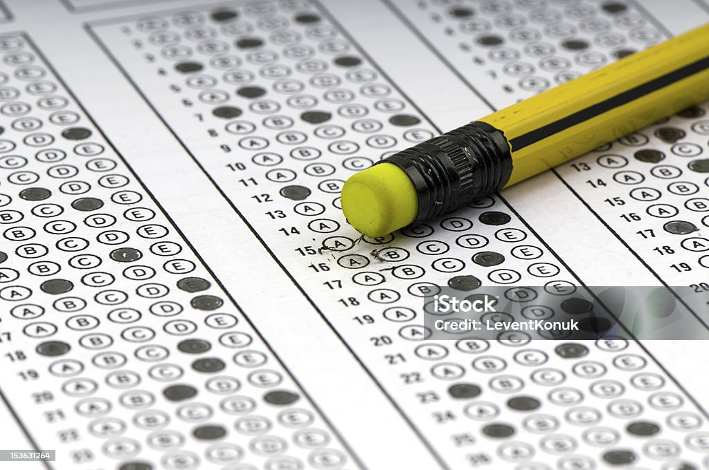 Answer Sheet Multiple choice examination form with yellow pencil. Checkbox Stock Photo