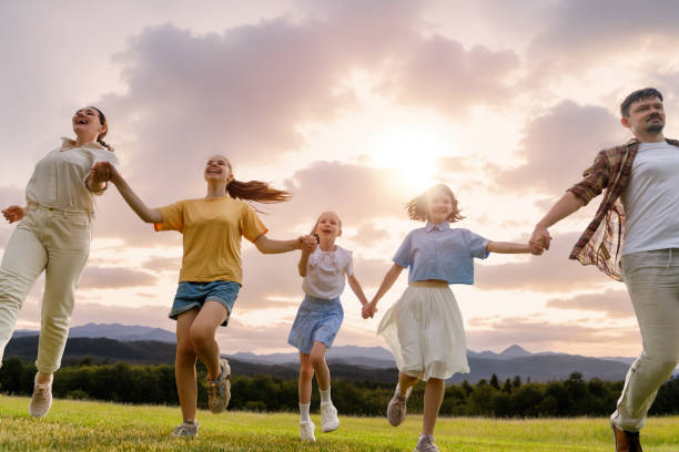 istock Happy family at sunset 1536364975