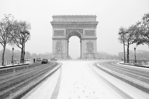 The arch of Triump of Paris under the snow and seen from the Champs Elysee avenue, Sunday December 19, 2010.